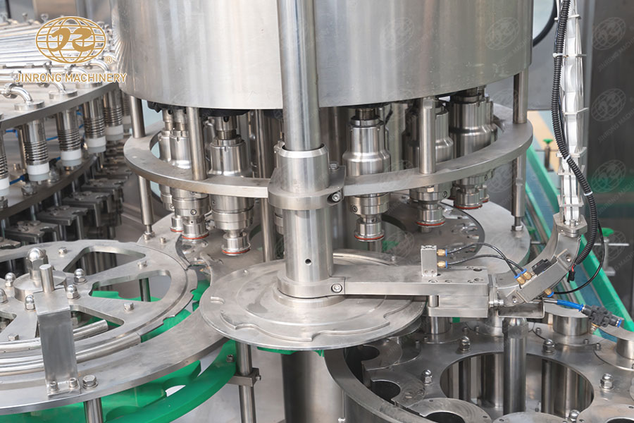 水灌裝機(jī)旋蓋部分 水灌裝機(jī)旋蓋部分